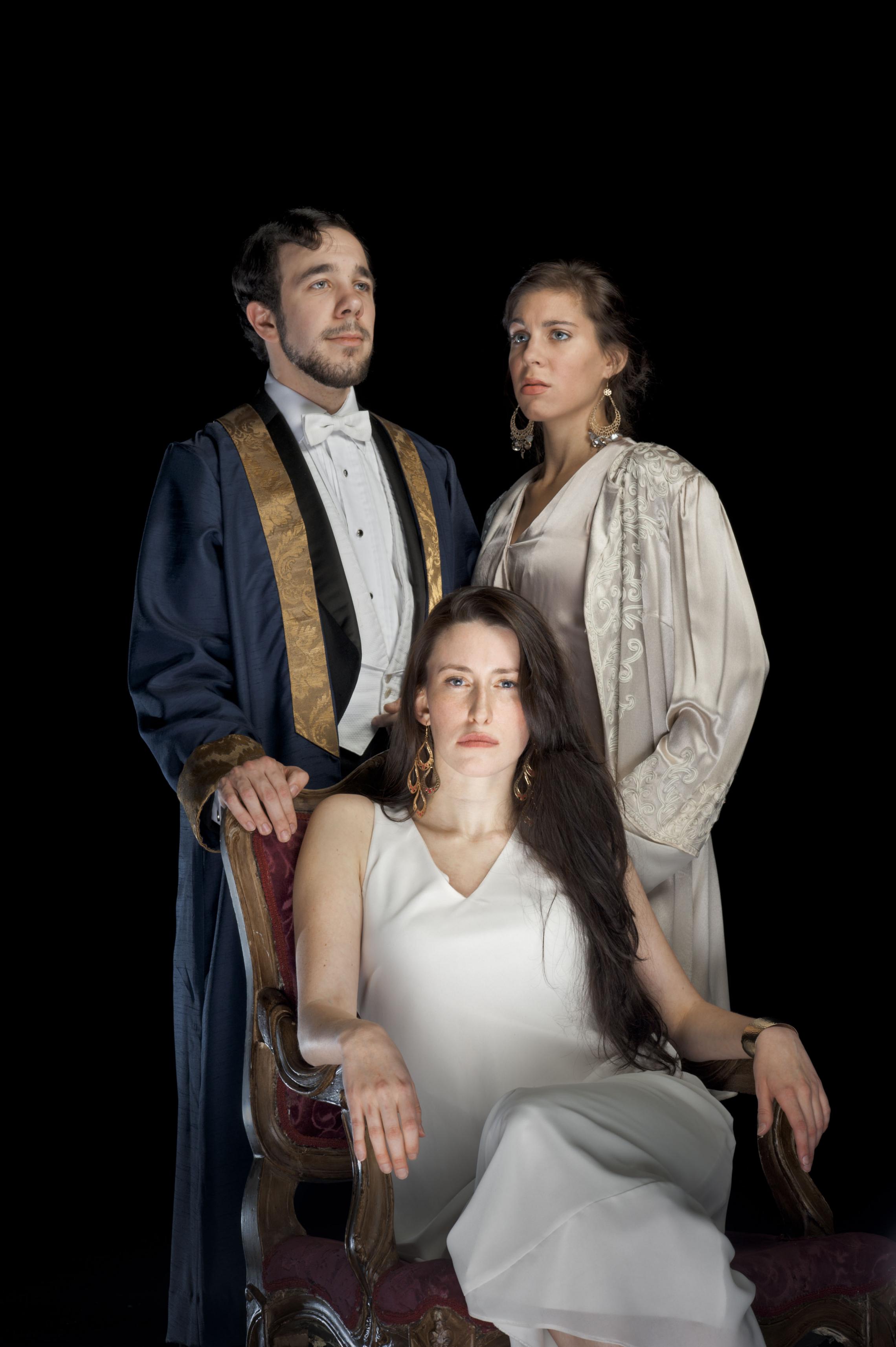 Royal Trojan Wedding Portrait: King Priam (Matthew Minnicino, standing left) and his wife Queen Hecuba (right, Mia Joshi) with Helen (seated, Emma Duncan)(Photo: Michael Bailey)