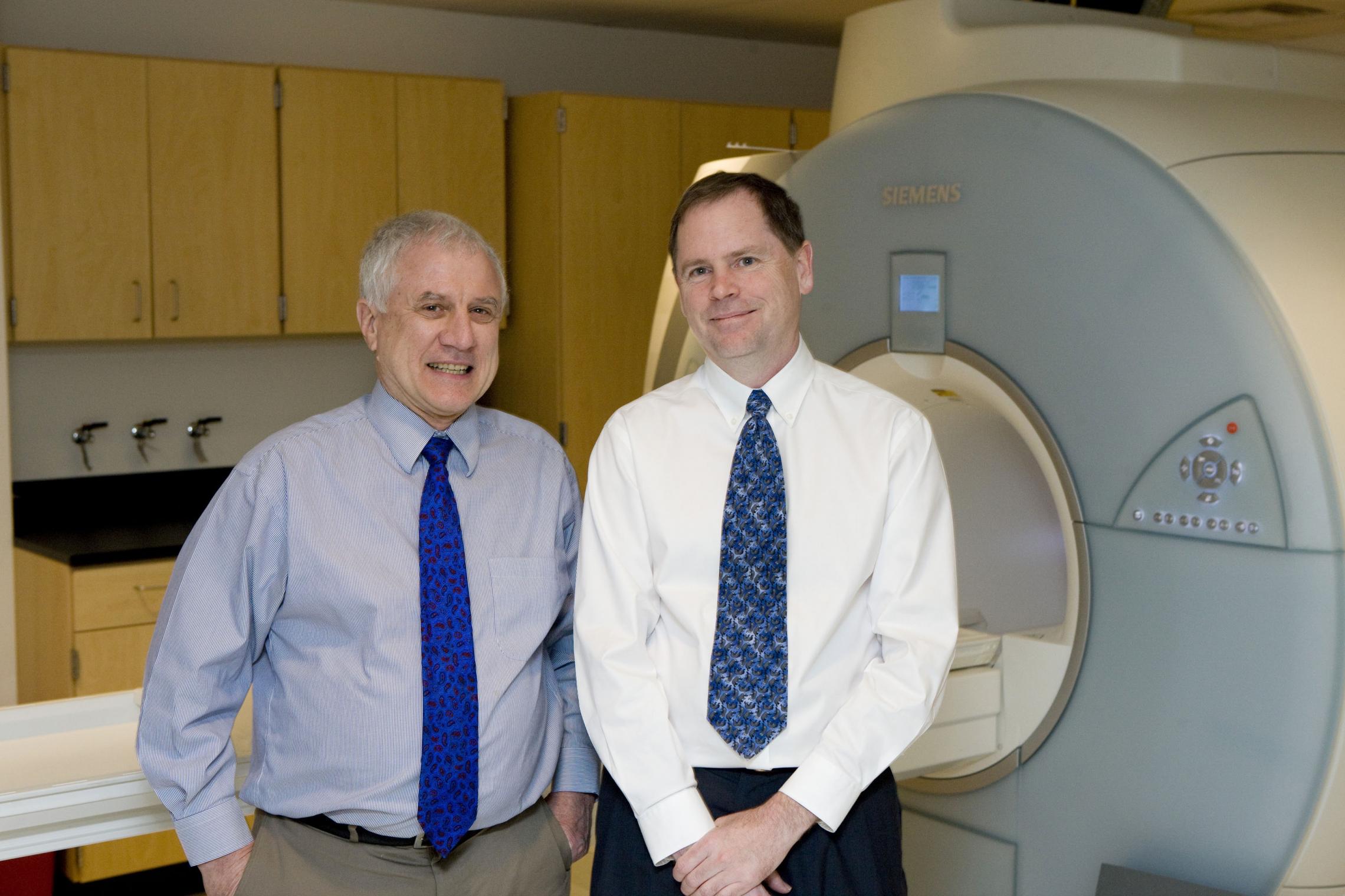 2009 Edlich-Henderson Inventors of the Year James R. Brookeman (left) and John P. Mugler III