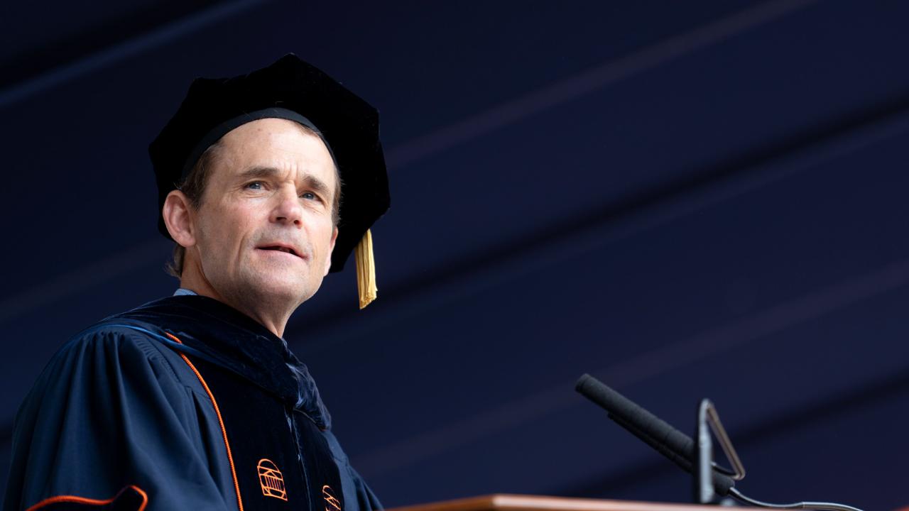 UVA President Jim Ryan looking out at the graduating class of 2025
