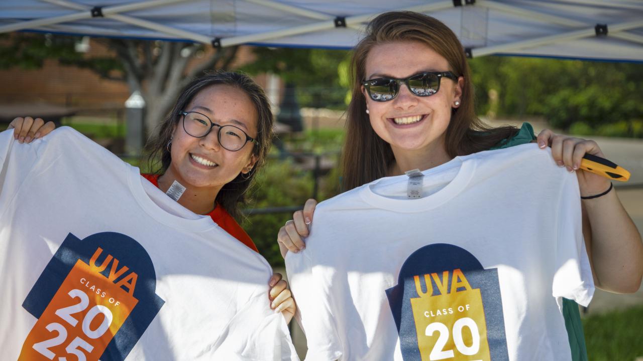Students holding a UVA Class of 2025 tshirts