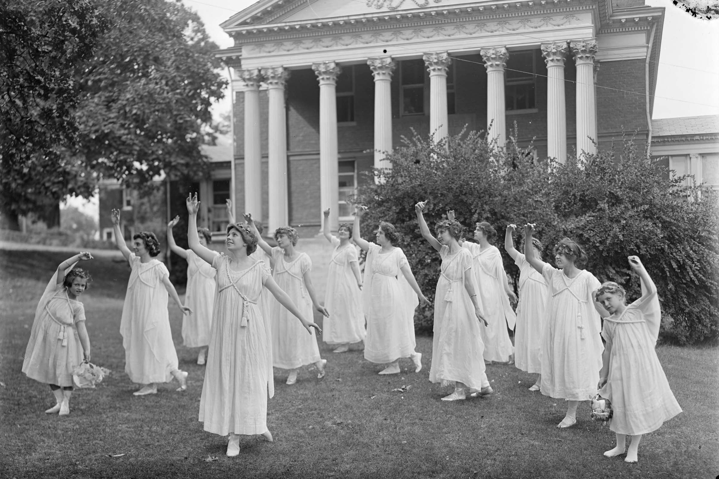 Black and white image of Female students dancing