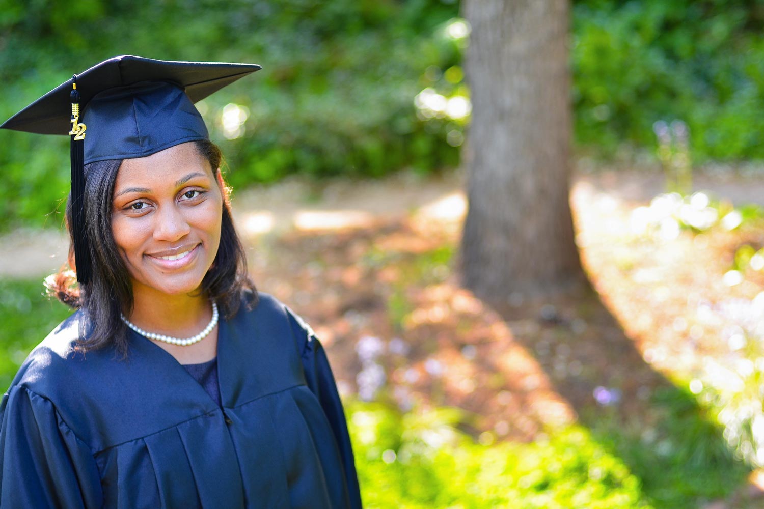 Tamara Wilkerson headshot in cap and gown