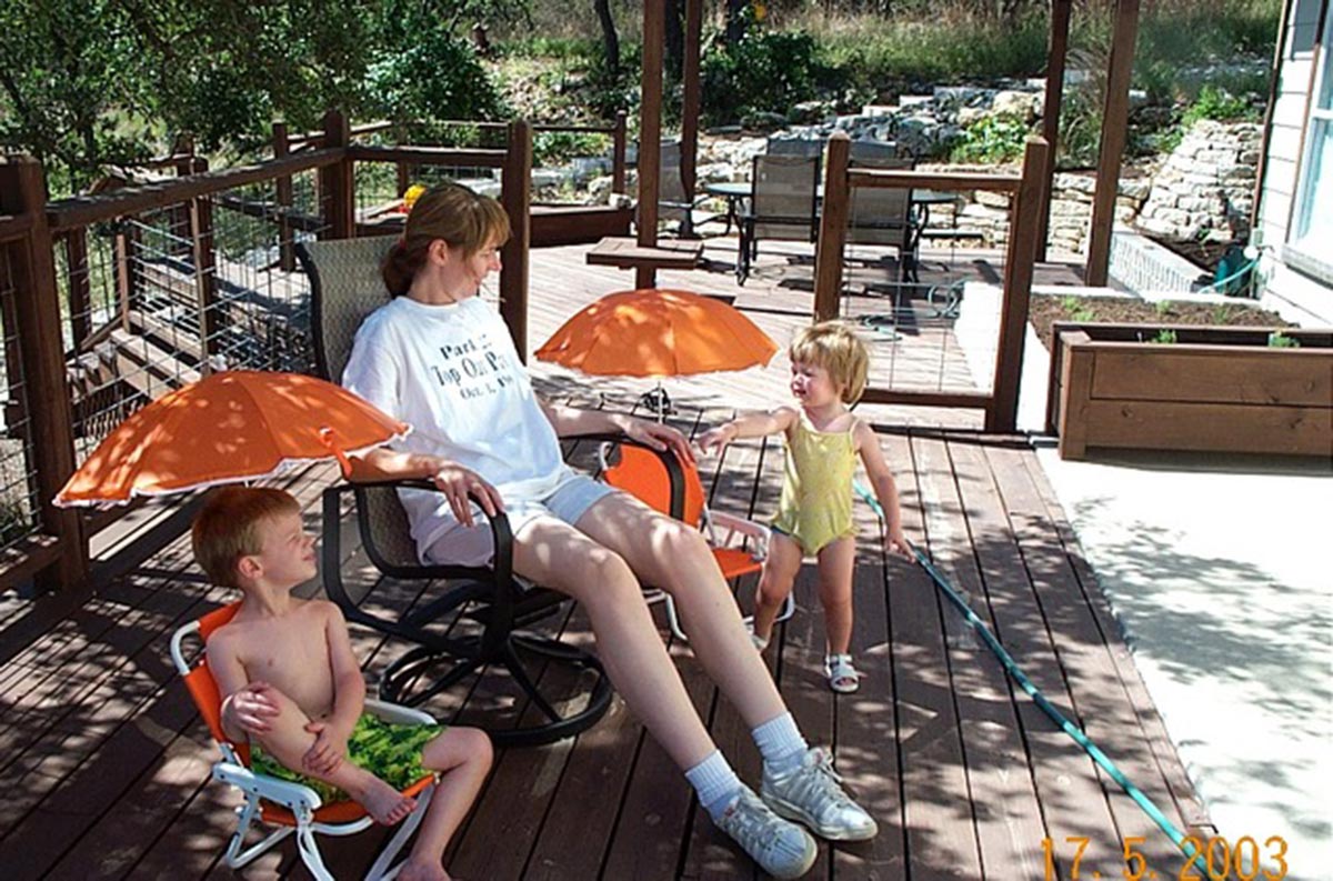 Thompson, left, with his mom, Maureen and younger sister Kyla. 