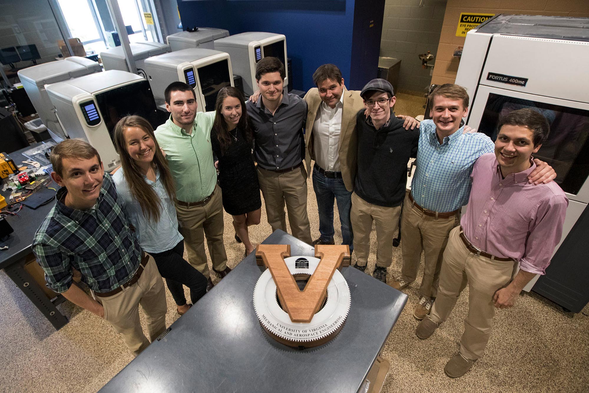 Group shot of the Gizmologists with their clock