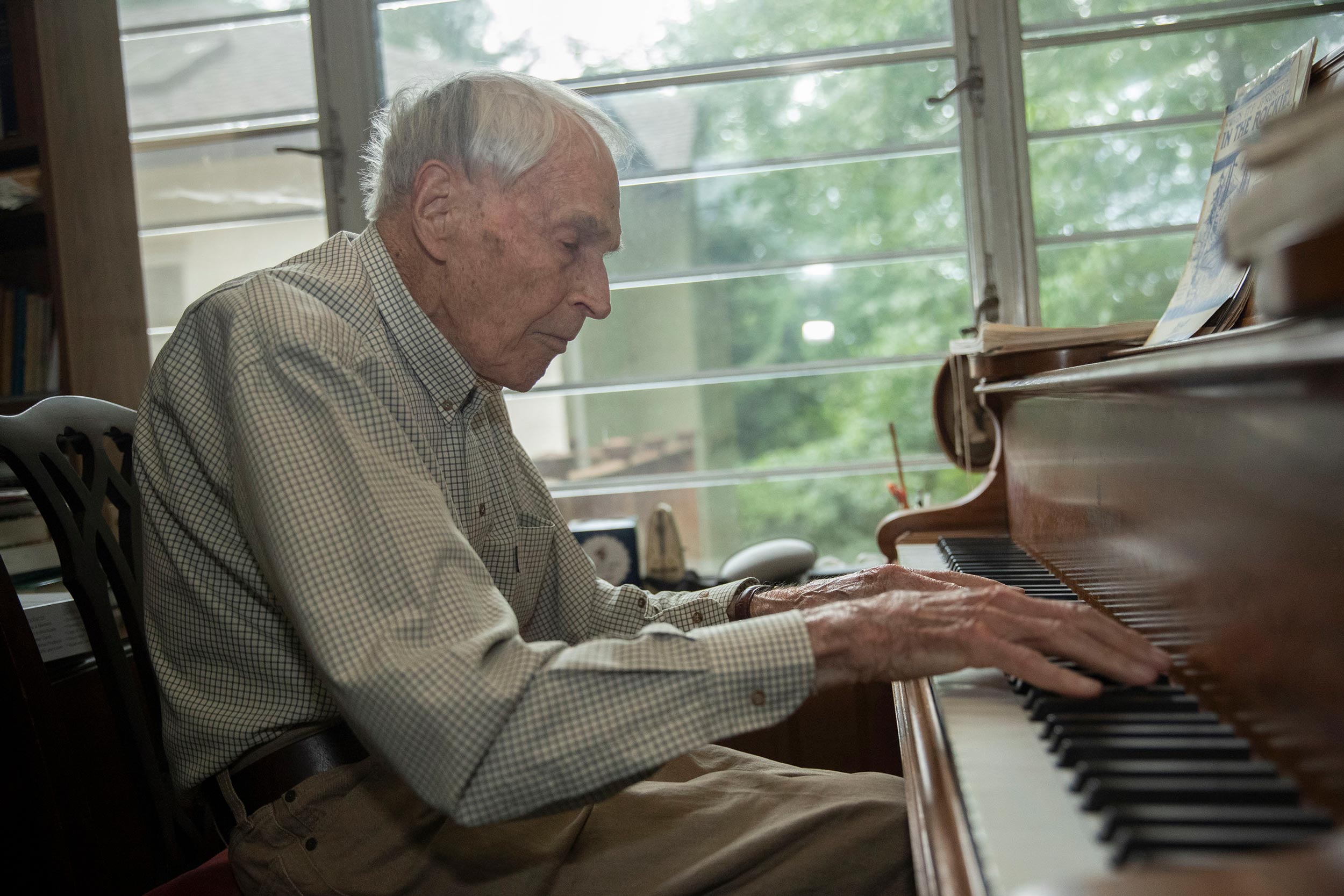 Crowell playing a piano 