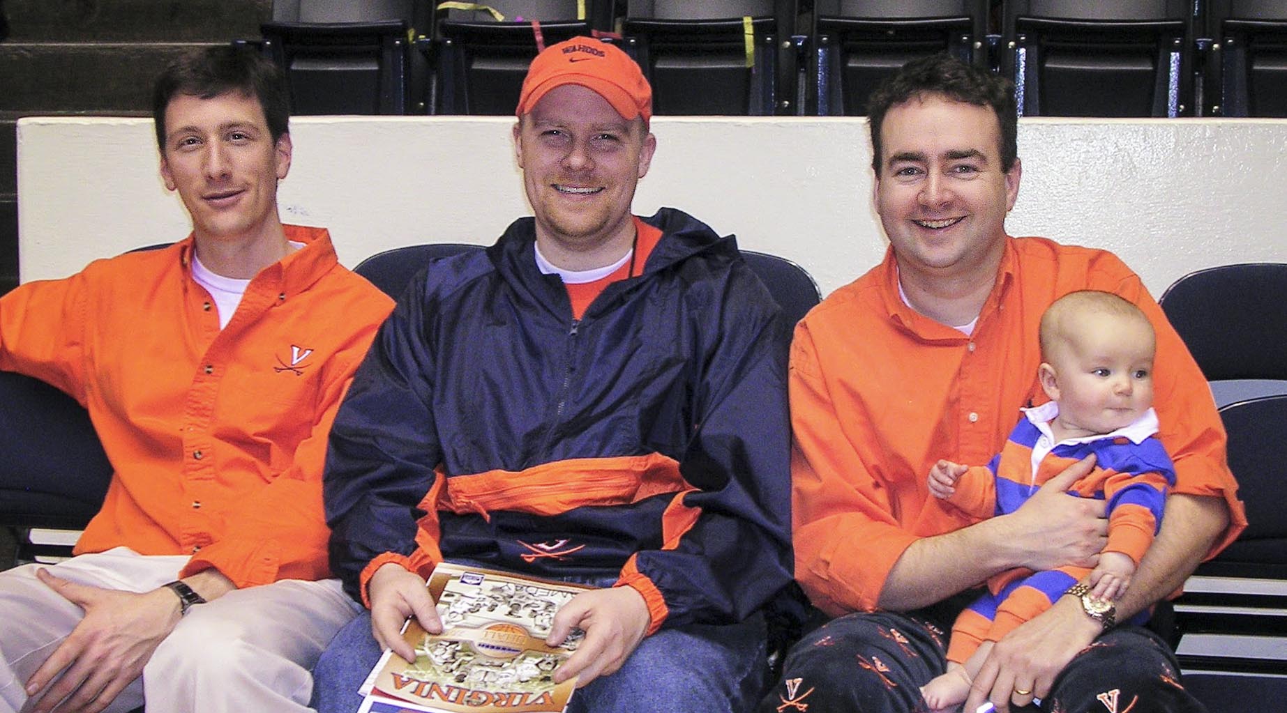 Edgemon, left, Lucas and Nerheim sitting in the stands