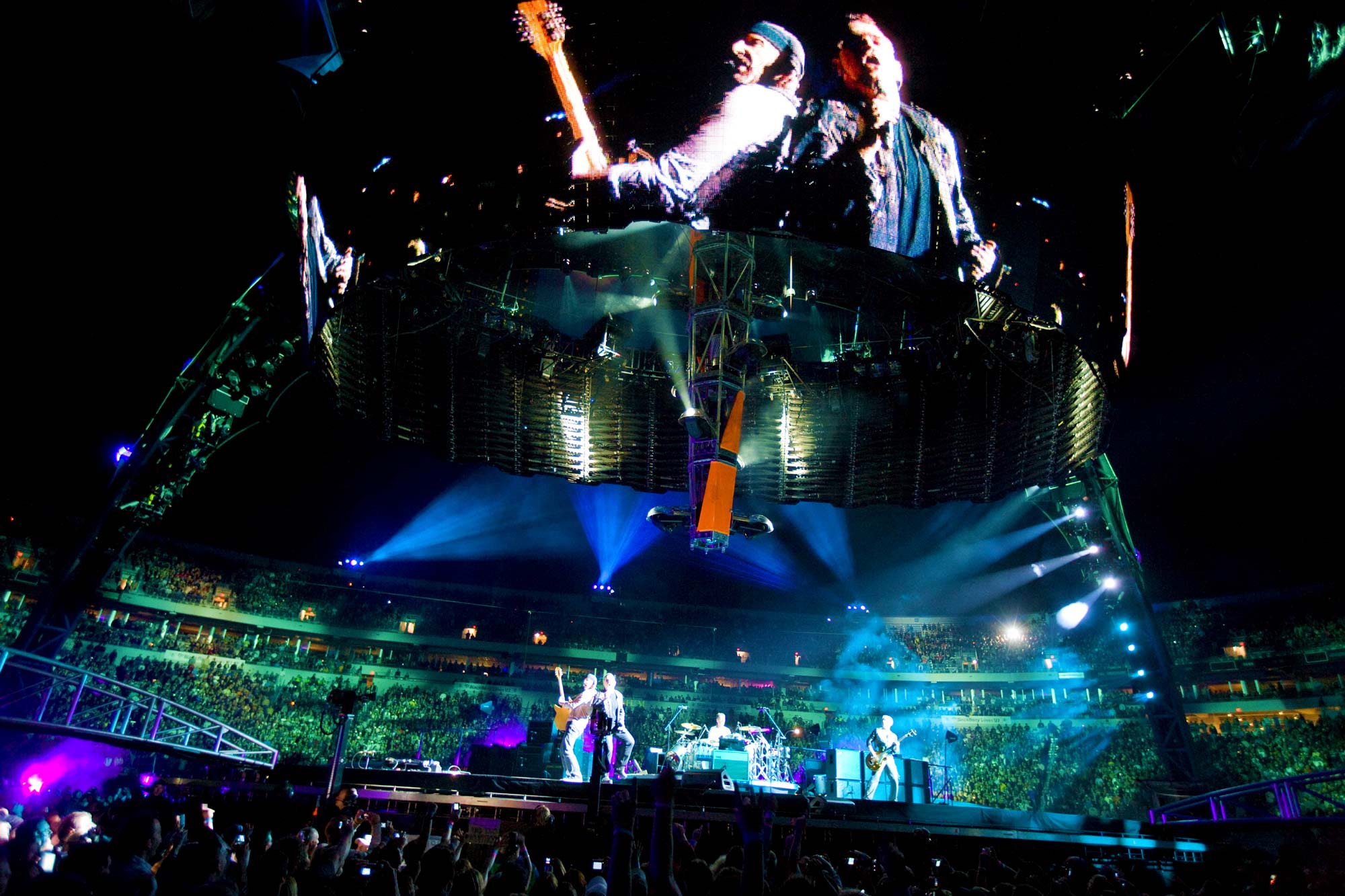 U2 playing on stage at Scott Stadium
