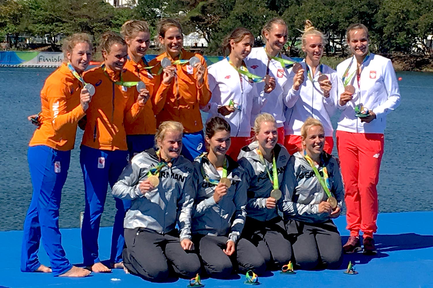 UVA alumna Inge Janssen, third from left on the top row, is part of the Dutch quadruple sculls team that captured a silver medal Thursday morning.