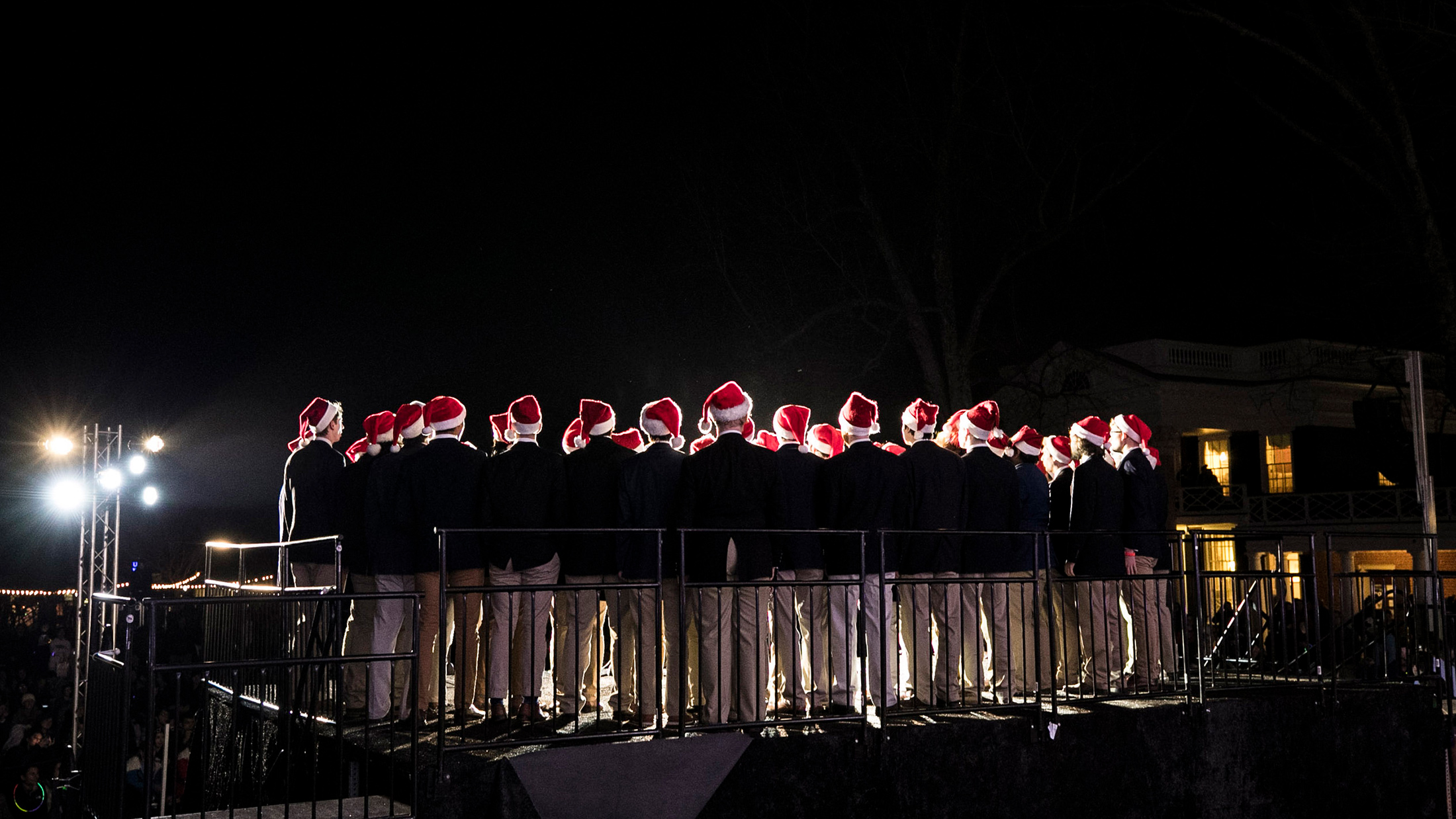 A group performs at Lighting of the Lawn