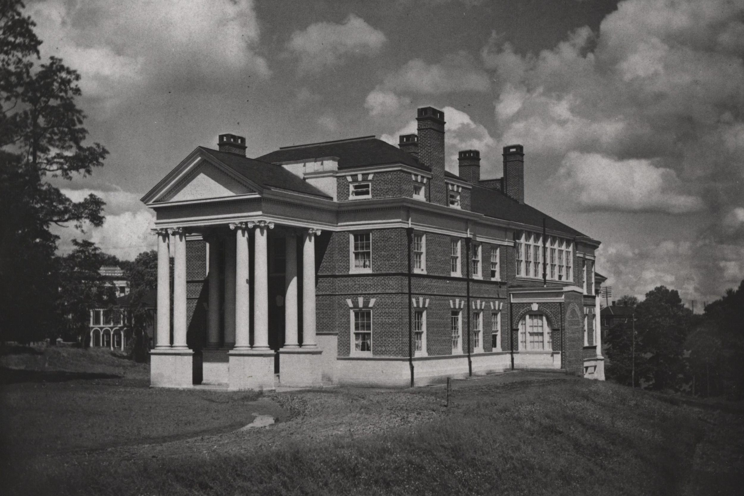Black and white image of the the first Hospital at UVA