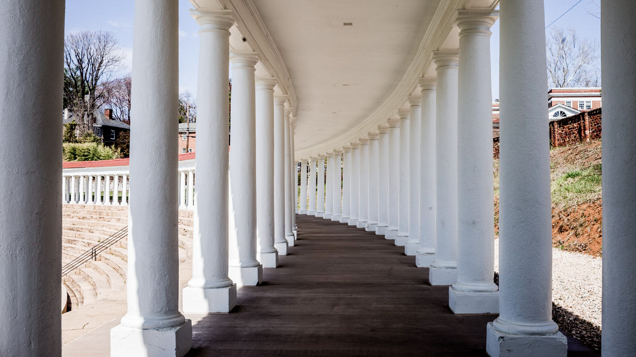 Arches pathway lined with white columns at the amphitheater 