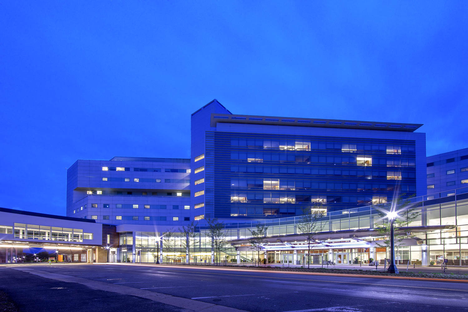 UVA hospital at dusk with lights on