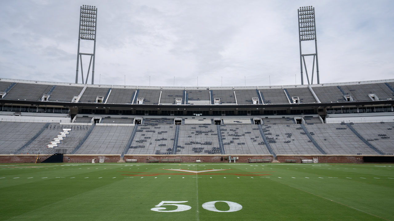 Looking at the empty stands from the 50 yard line from the opposite sideline