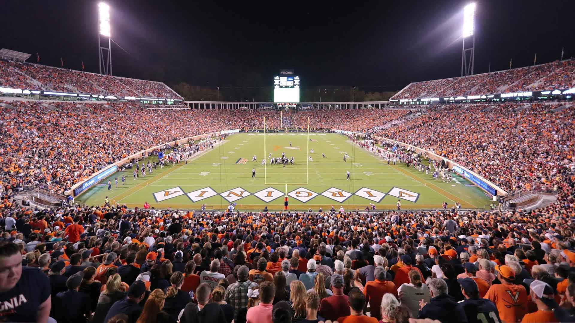 Scott Stadium filled with fans watching a game