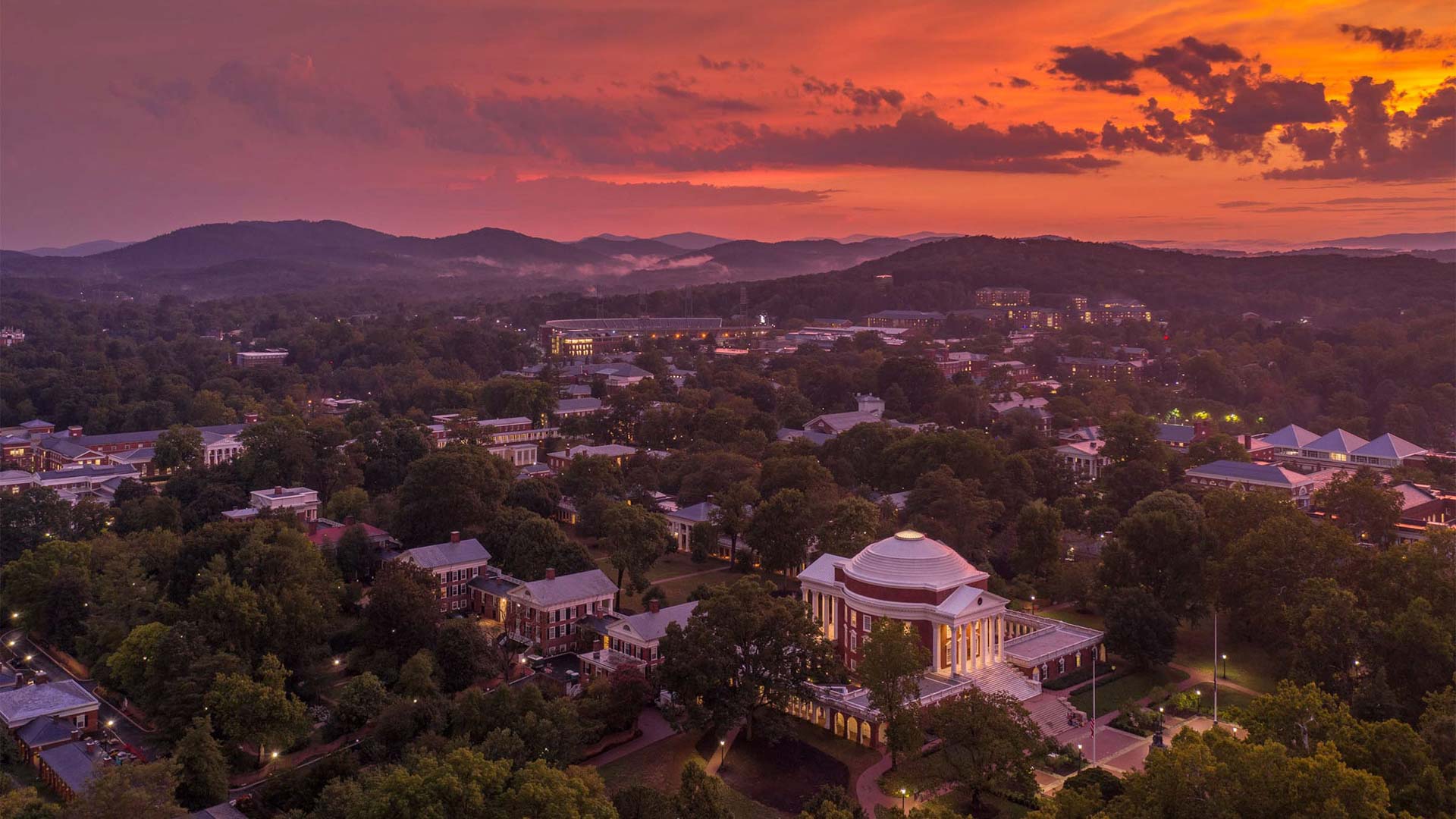 Arial View of the Rotunda with a pink, orange, and purple sunset