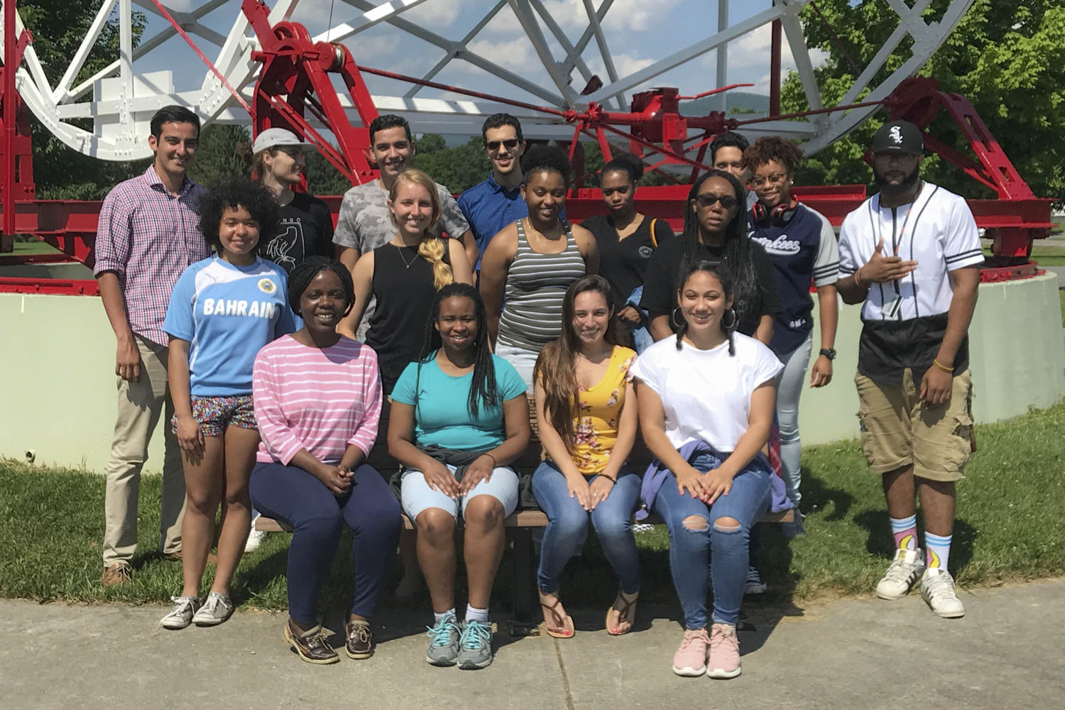 The Virginia-North Carolina Alliance program pose for a photo in front of the Reber Telescope 