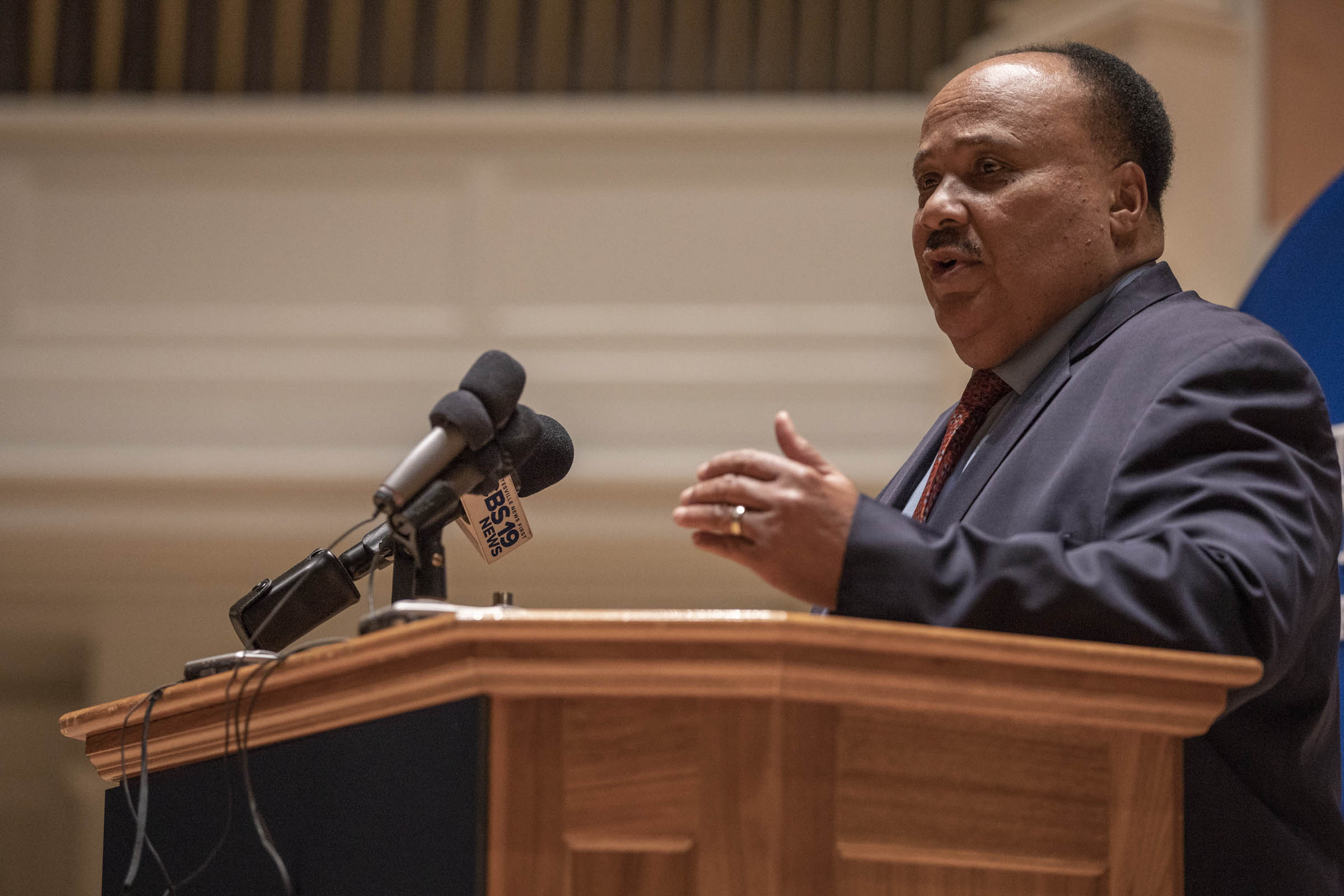 Martin Luther King III speaking at a podium