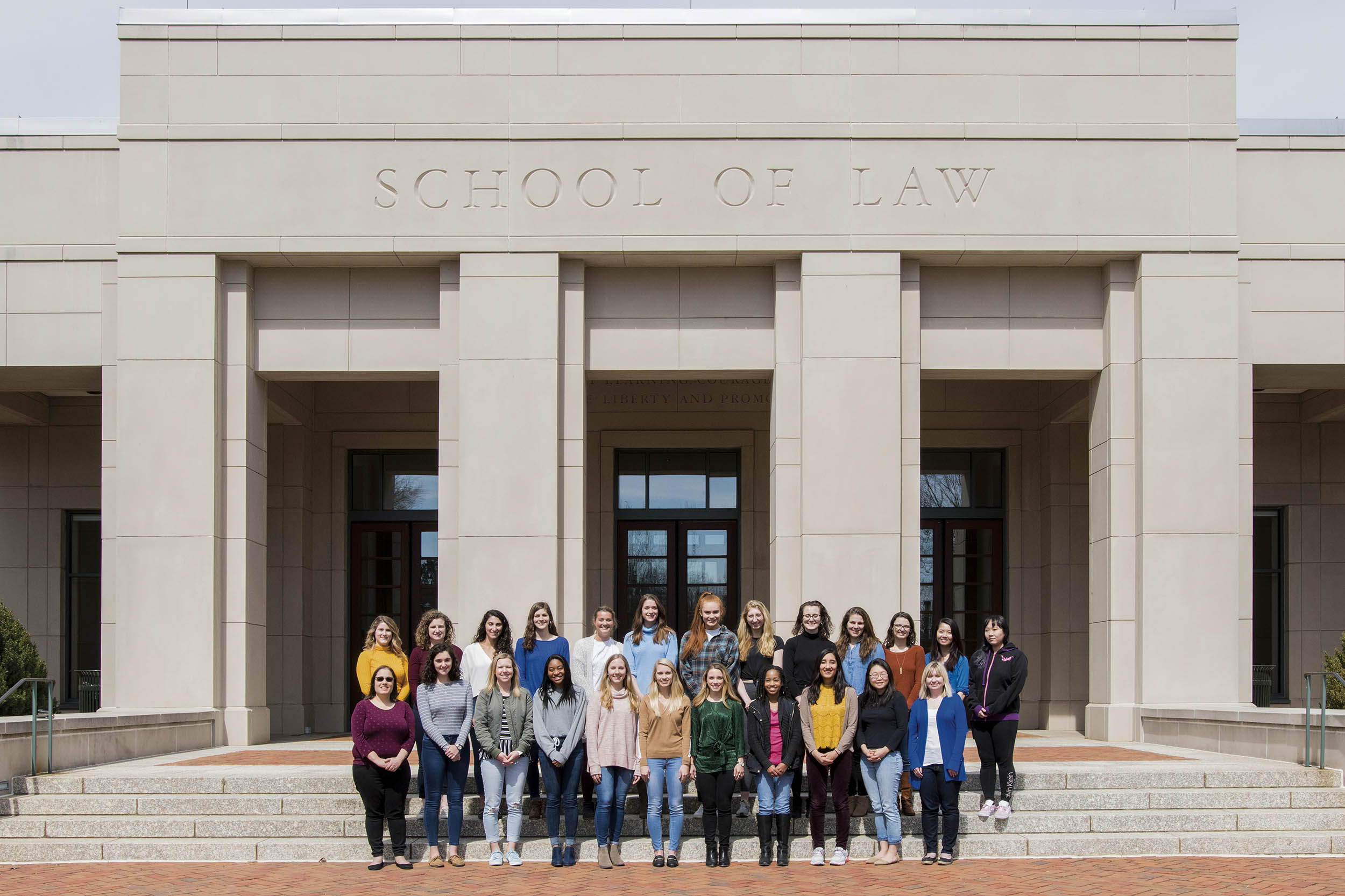 Group photo in front of the School of Law building