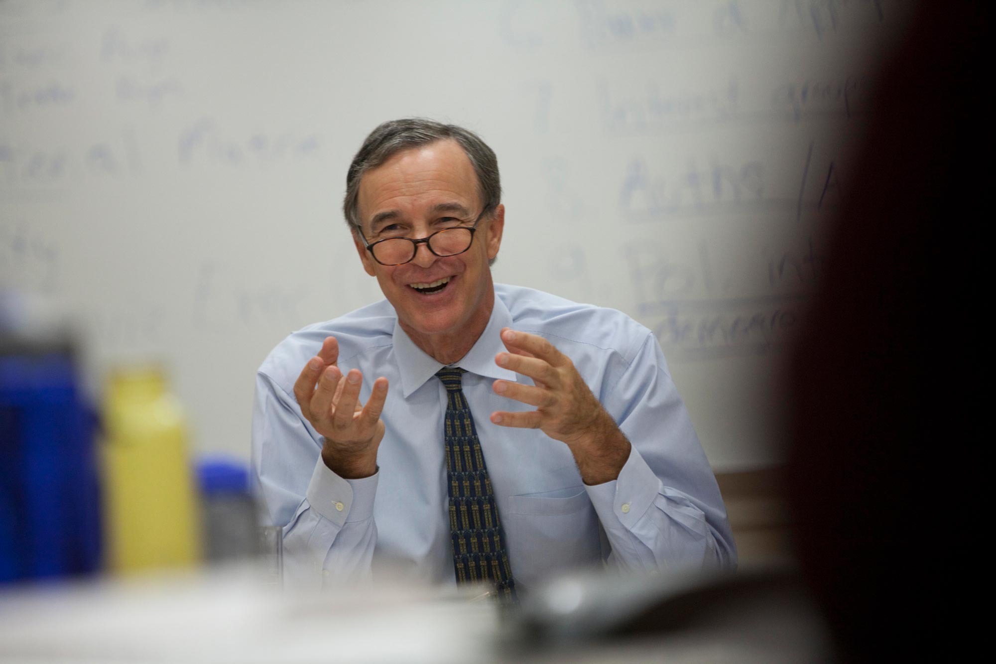 Gerry Warburg talks to class from the front of the class