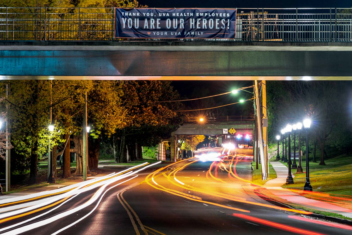 Bridge with a banner that reads: Thank you UVA health employees you are our Heroes!  Your UVA Family