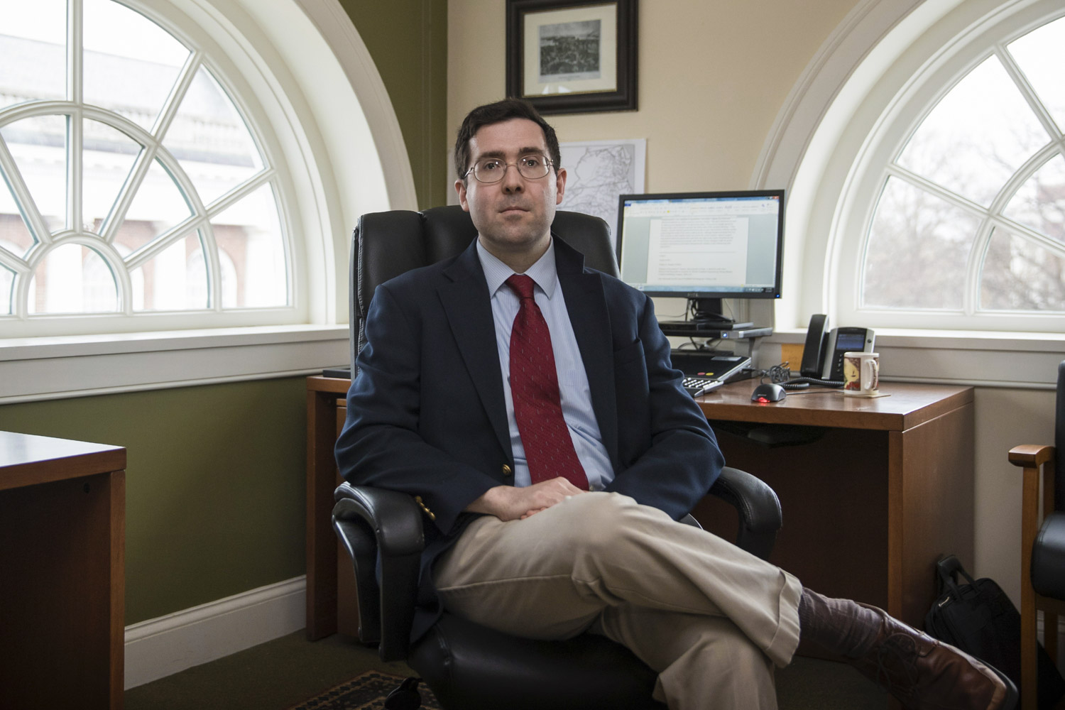 William Kurtz sits in chair looking at the camera