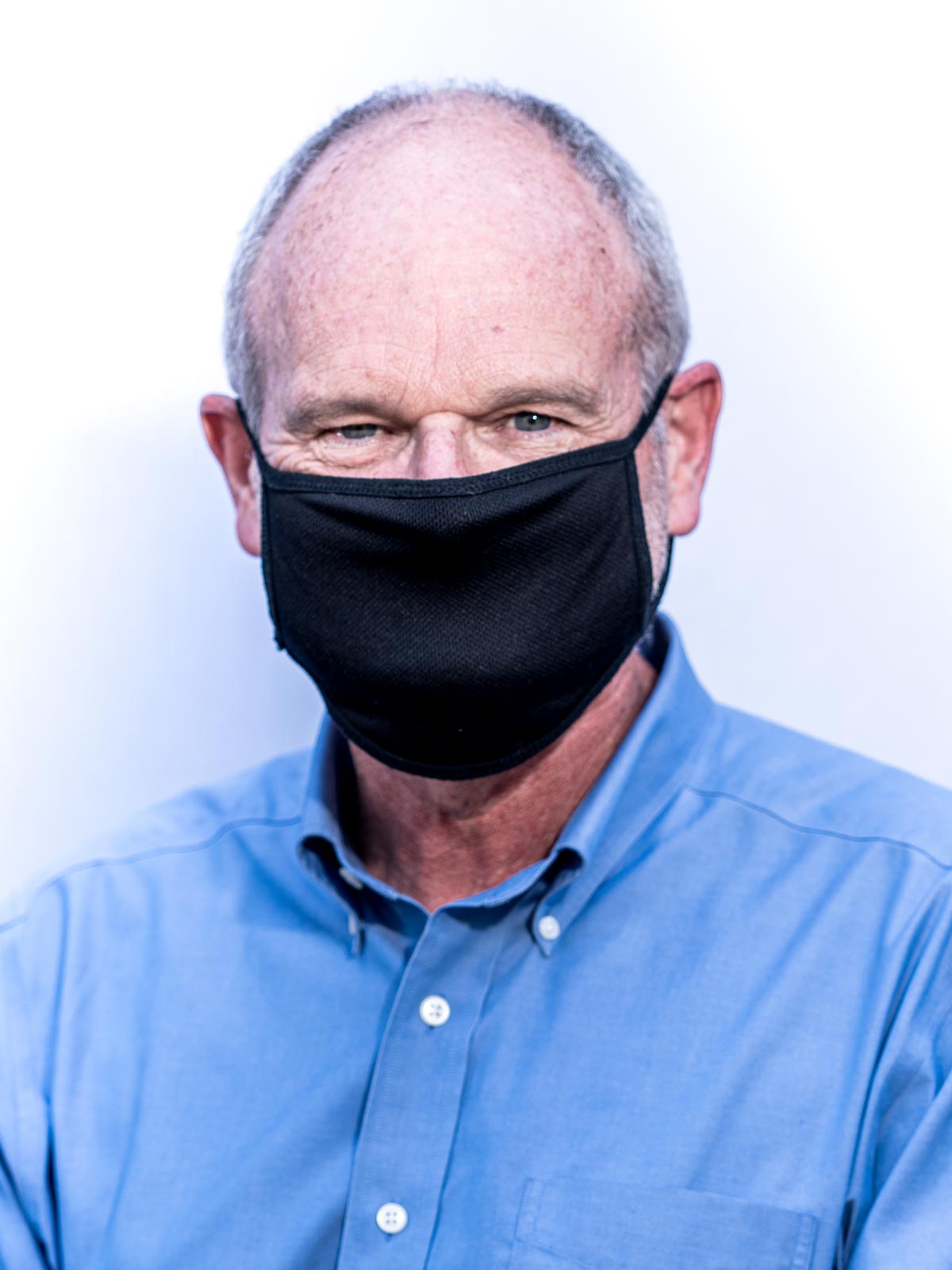 Dr. William Petri wearing a mask headshot