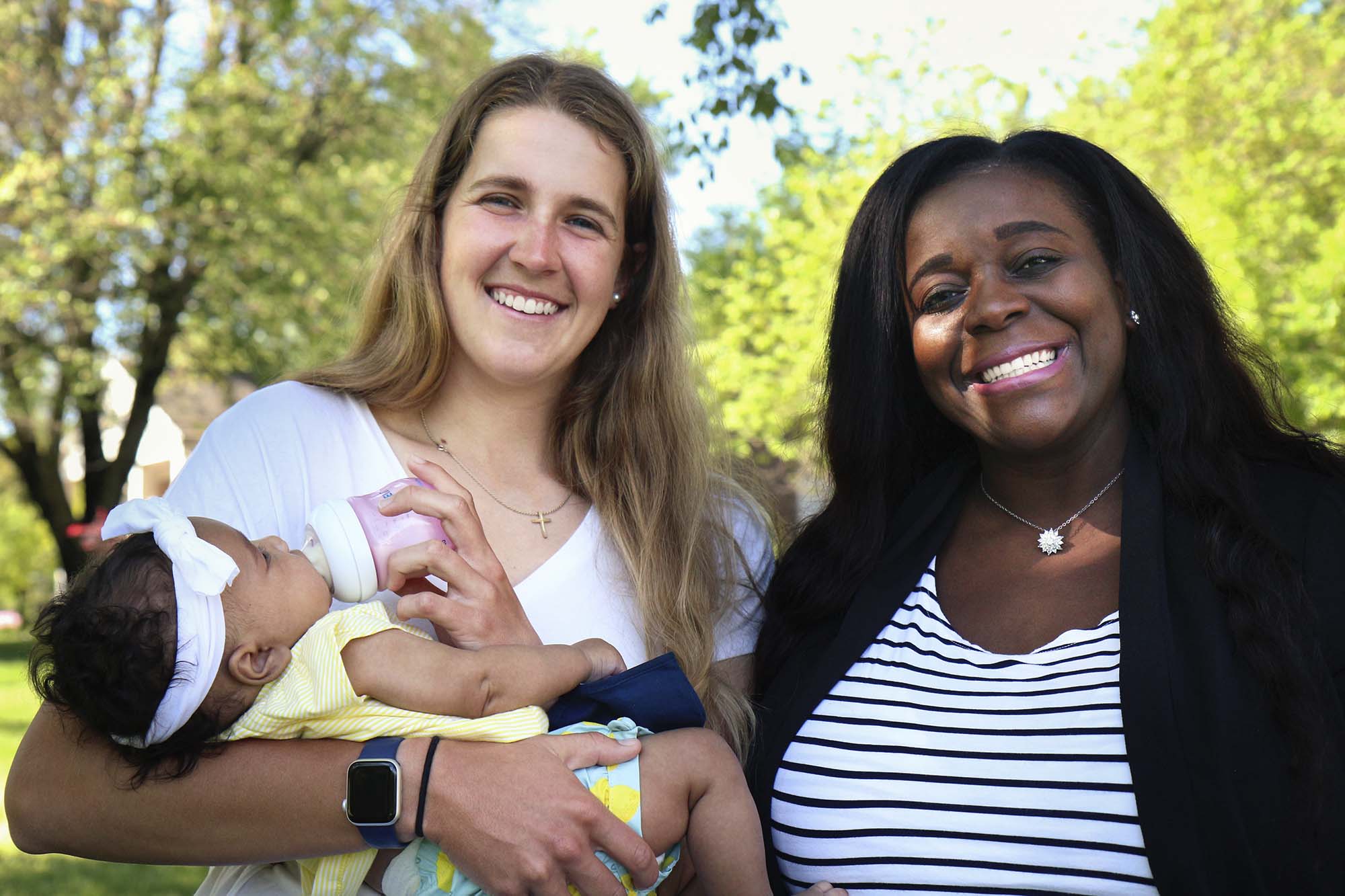 Madi Aurand (left) holding baby Brielle, as they pose with Madi's mom, Rachelle Aurand, right,