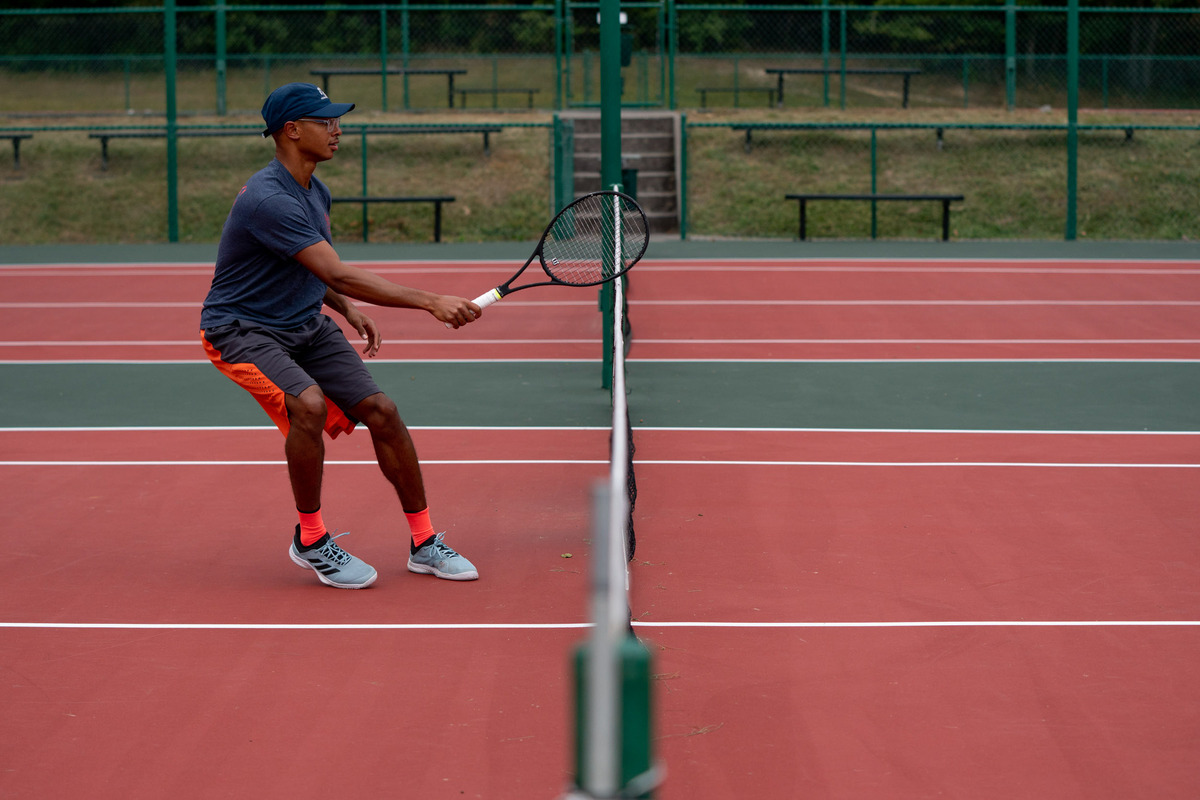 UVA Wise tennis player playing on the court