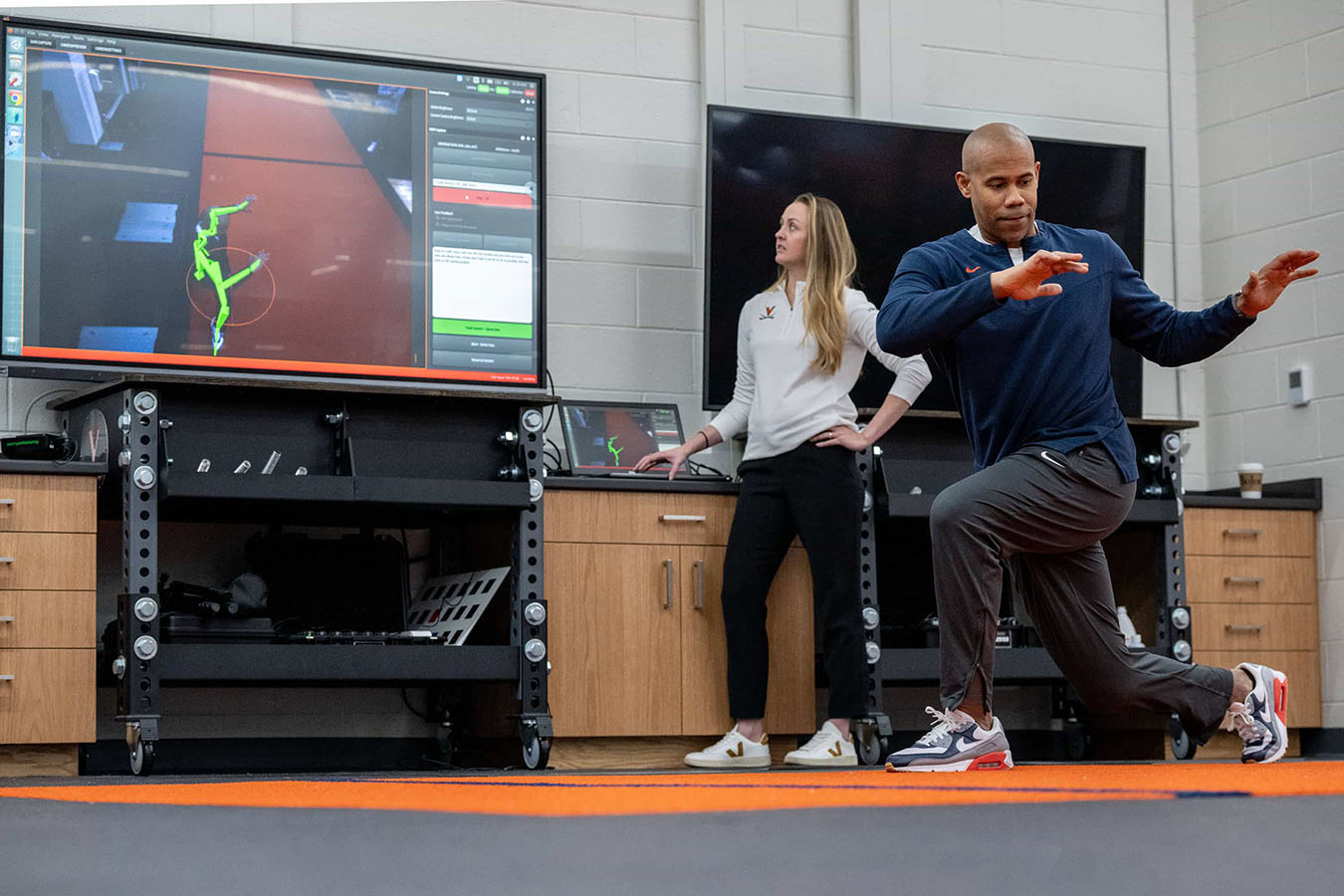 Mike Curtis showing the digital tracking of the equipment while performing lunges