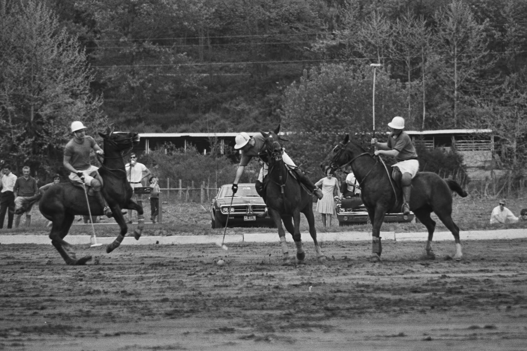 Three players vie for the ball on the club’s first field on property owned by engineering professor E. J. Oglesby at his Brook Hill Farm in the 1960s